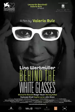 Behind the White Glasses